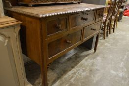 A mahogany dressing chest.