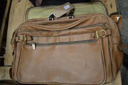 A leather holdall.