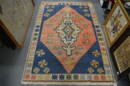 A Persian style rug 200cm x 130cm.