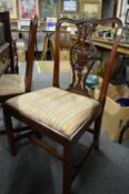A good pair of Chippendale style mahogany single dining chairs with carved vase back splats, drop-in