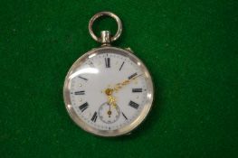 A ladies' silver cased fob watch with enamel dial.