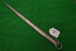 A plated meat skewer.