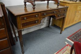 A mahogany side table with an arrangement of five drawers (legs af).