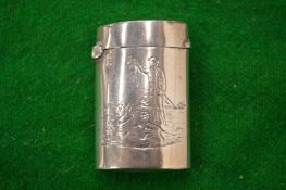 A Victorian silver vesta case engraved with a man with gun dogs and game.