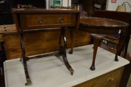 Two occasional tables.