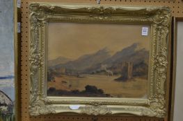 A early watercolour of a river scene with folly in a decorative gilt frame.