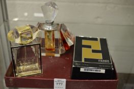 Two perfume bottles.