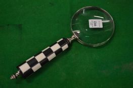 A magnifying glass.