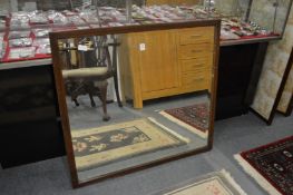 An oak framed mirror.