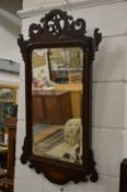 A Georgian style mahogany fretwork framed mirror.