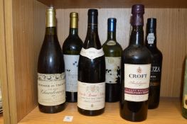 Six bottles of wine and port.