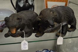 Two black forest carved wood bears.
