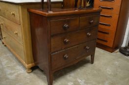 A mahogany chest of drawers.