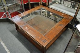 A large rustic coffee table.