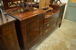 A mahogany sideboard.