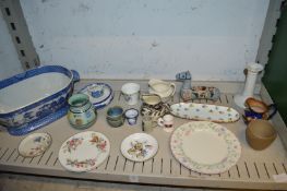 Decorative china to include a blue and white willow pattern tureen.