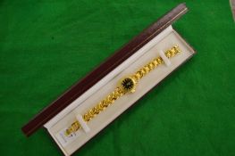 A ladies gilt metal wristwatch.