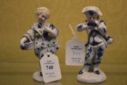 A small pair of blue and white figures.