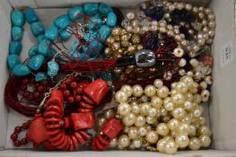 A quantity of decorative necklaces.