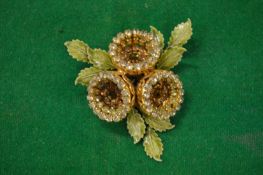 A decorative designer brooch signed Vendome.