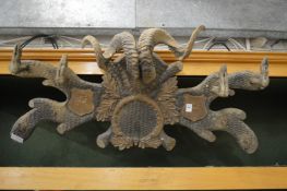 Black forest carved wood coat rack.