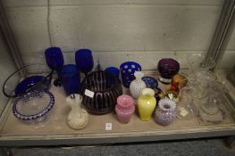 A quantity of decorative glassware.