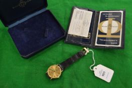 A gentlemen's 18ct gold Baume & Mercier quartz wrist watch, boxed with papers.