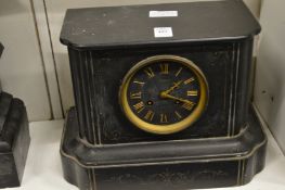 A slate mantel clock.