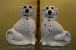A pair of large Staffordshire dogs.