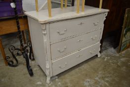 A painted three drawer chest.