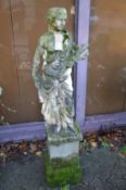 A large composite garden ornament modelled as a classical female figure on a square pedestal base.