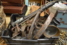 A quantity of bygones to include flat irons, door stops etc.