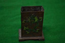 A cloisonne match box holder.