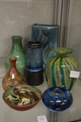 A Lamorna slab sided vase, a Mdina glass vase and other decorative vases and bowls.