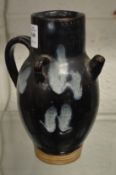 A Chinese Jun style glazed pottery ewer.