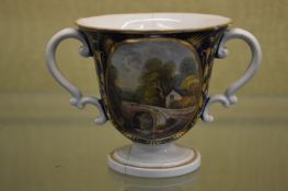 A small Derby twin handled cup.