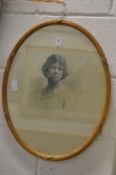 Photographic study of a young lady, oval.