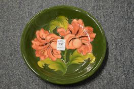 A Moorcroft Hibiscus circular dish.