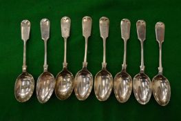 A set of eight silver teaspoons.
