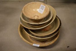 A small group of terracotta bowls.