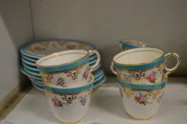 A floral decorated part tea service.