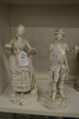A pair of blanc de chine figures of a man and woman (af).