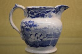 A small blue and white jug.