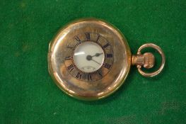 A gentlemen's gold plated half hunter pocket watch.