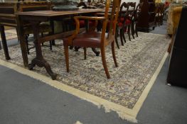 A good large cream ground Indian carpet with stylised floral decoration 370cm x 275cm.