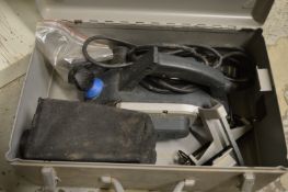 An Elu electric planer with metal carrying case.
