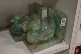 A pair of carved hardstone bird bookends (af).