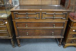 The matching gentleman's chest with lifting top revealing a trouser press.