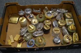 A collection of table and other lighters.