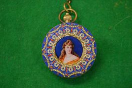A highly ornate pocket watch with pictorial centre to both sides with enamel and pearl decoration.